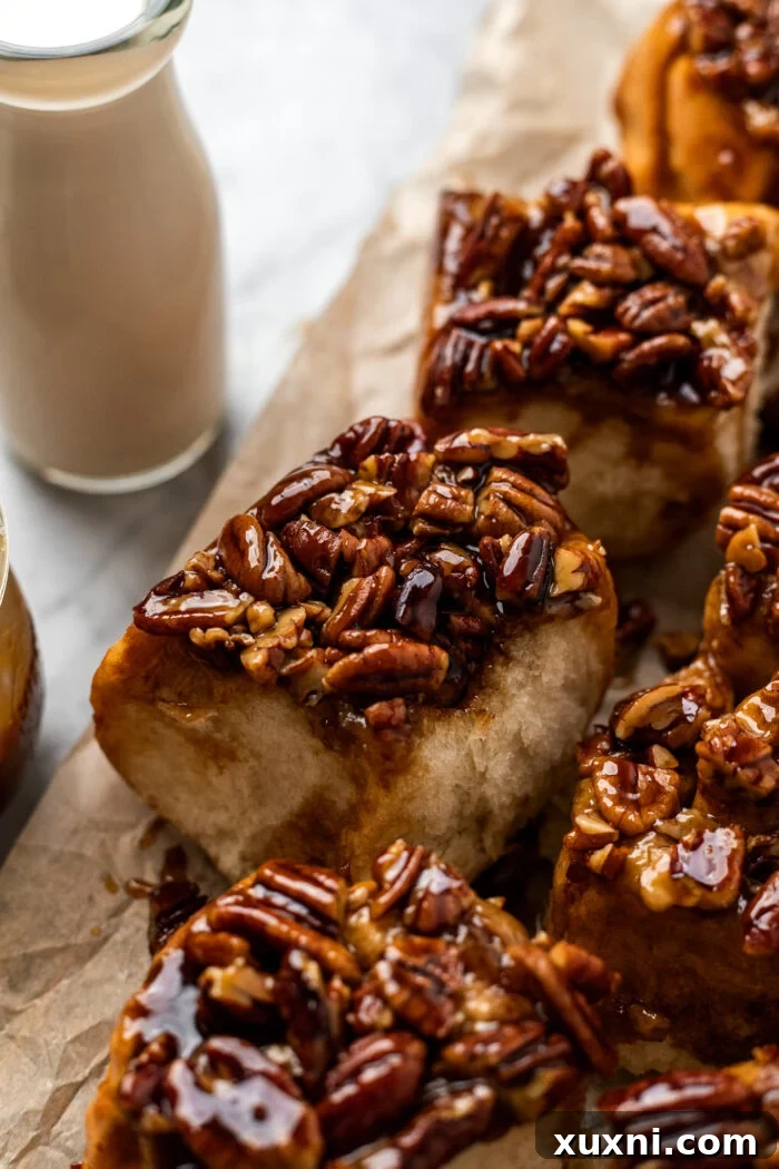 Maple Vegan Sticky Buns on parchment paper