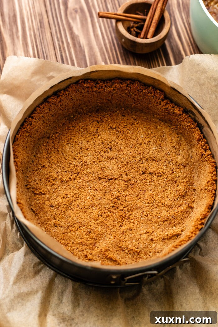 Ultimate Gooey Vegan Pecan Pie Cheesecake 10 A crisp, par-baked cheesecake crust waiting for its fillings.