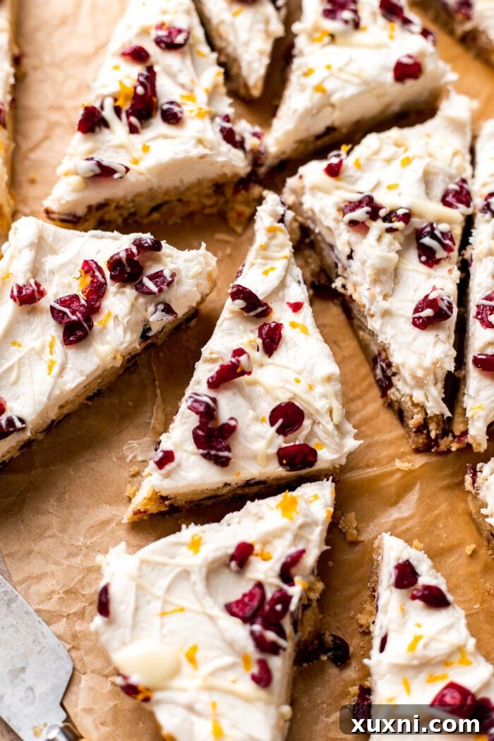 close-up of sliced vegan cranberry bliss bars, showing texture