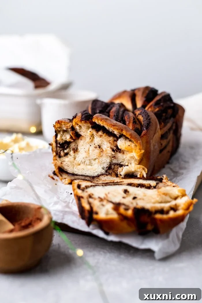 Delicious slices of vegan chocolate babka with a visible chocolate swirl