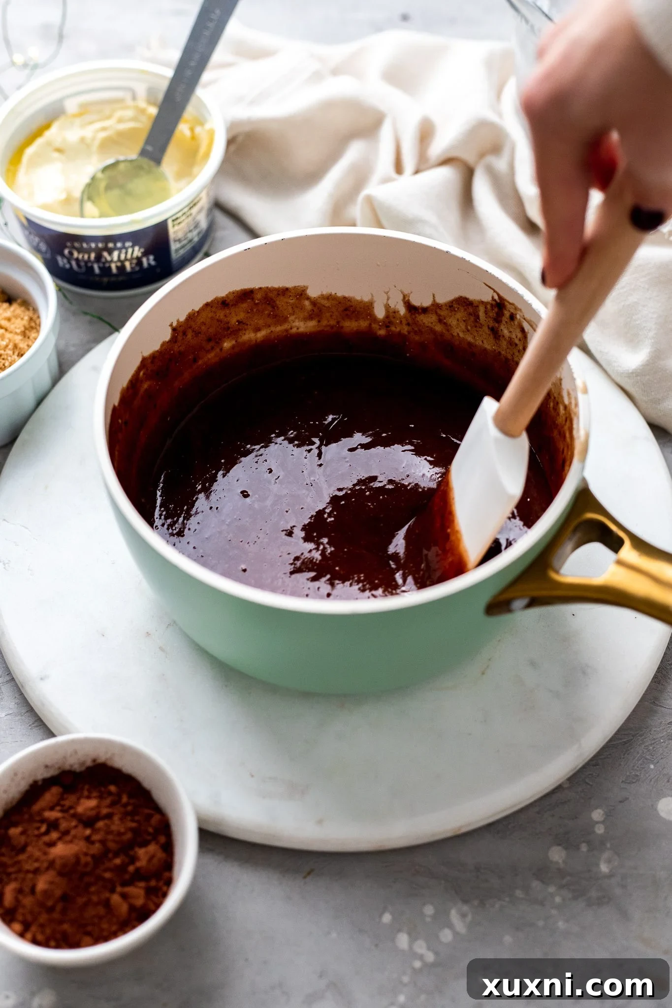 Melted chocolate filling being prepared in a saucepan