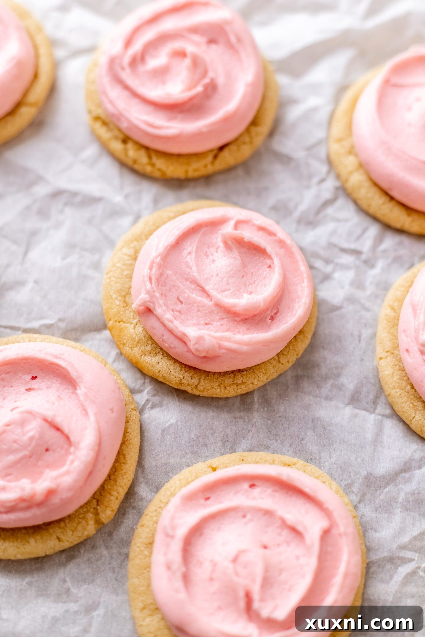 Quick & Easy Peppermint Meltaways with Peppermint Cream Cheese Frosting, beautifully decorated with crushed peppermint candies.