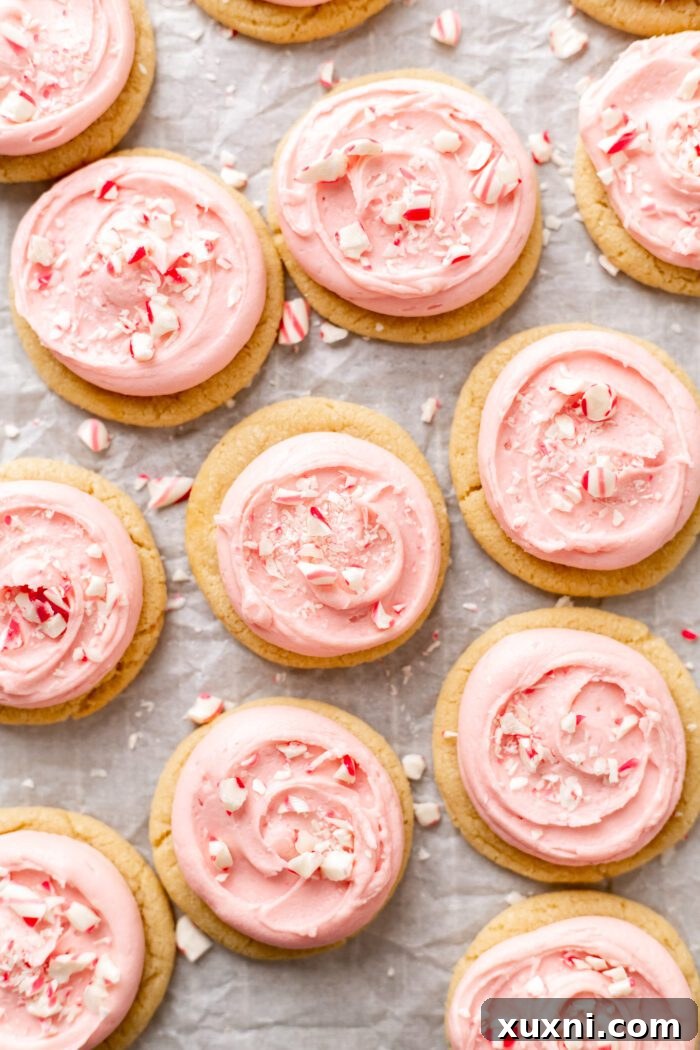 Tray of frosted peppermint meltaway cookies, ready for a cookie exchange or holiday party.
