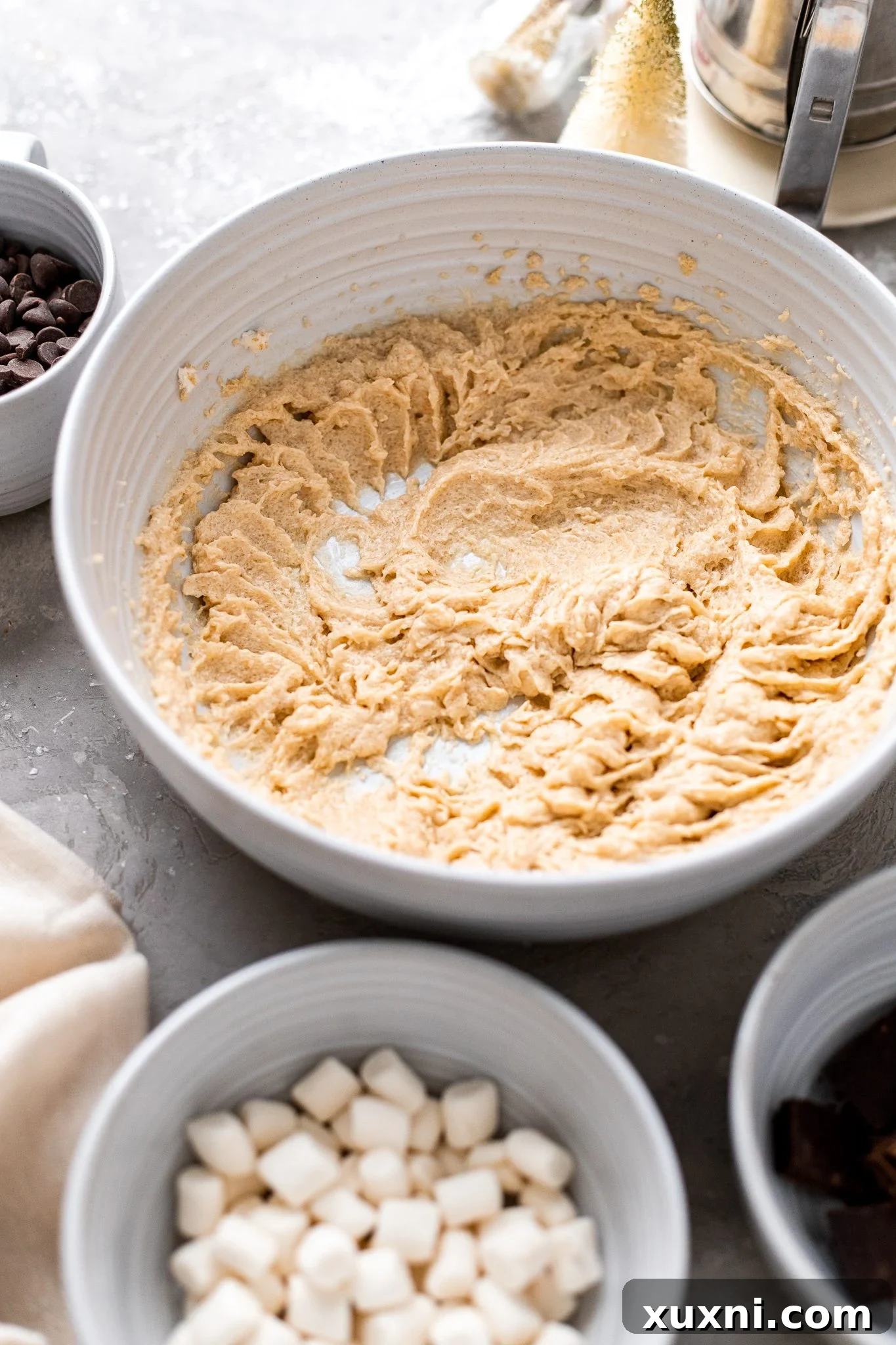 Creamed vegan butter and sugar mixture, a crucial step for light and fluffy vegan hot chocolate cookies.