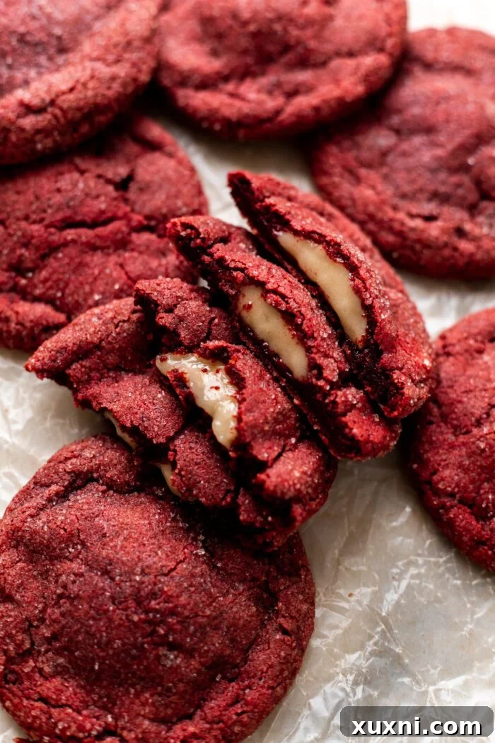 creamy red velvet cookies with a sprinkle of sugar