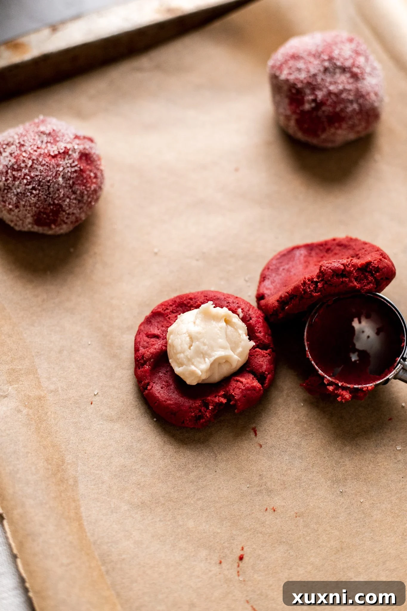 process of filling red velvet cookies with cream cheese