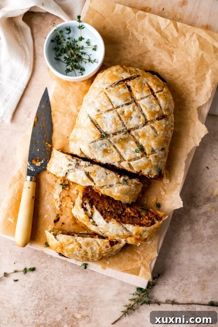 sliced Vegan Wellington on a cutting board