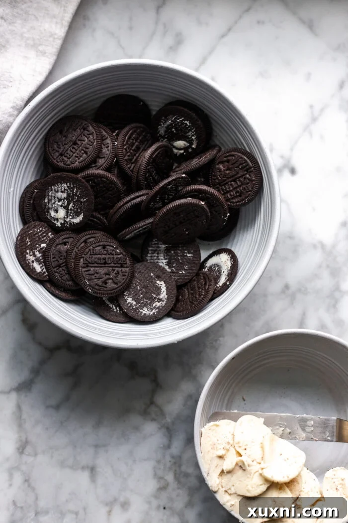 Oreo cookies with their cream filling carefully removed and set aside, ready for the next step of the recipe.