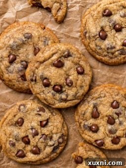 vegan small batch chocolate chip cookies on parchment paper