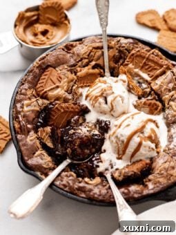 vegan Biscoff Brownies in a skillet
