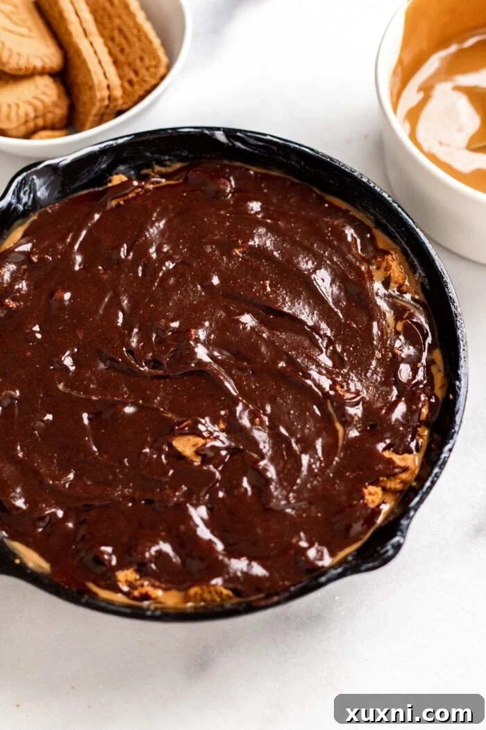 The Biscoff brownie skillet with all layers assembled, before baking.