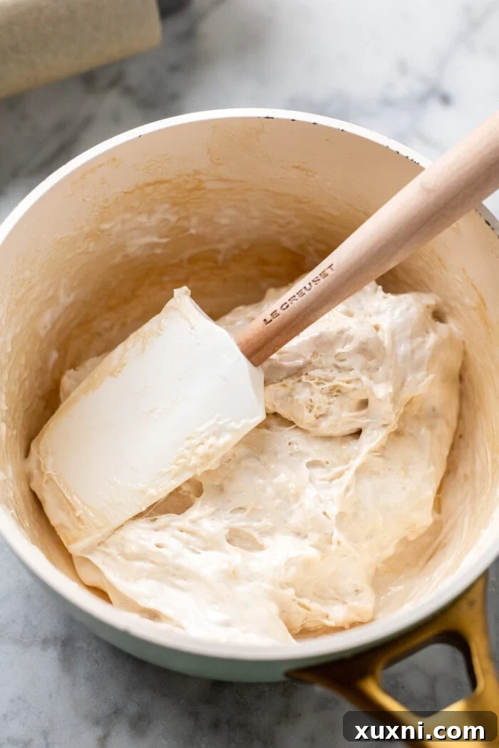 Smooth vegan marshmallow fluff in a pan, ready for layering