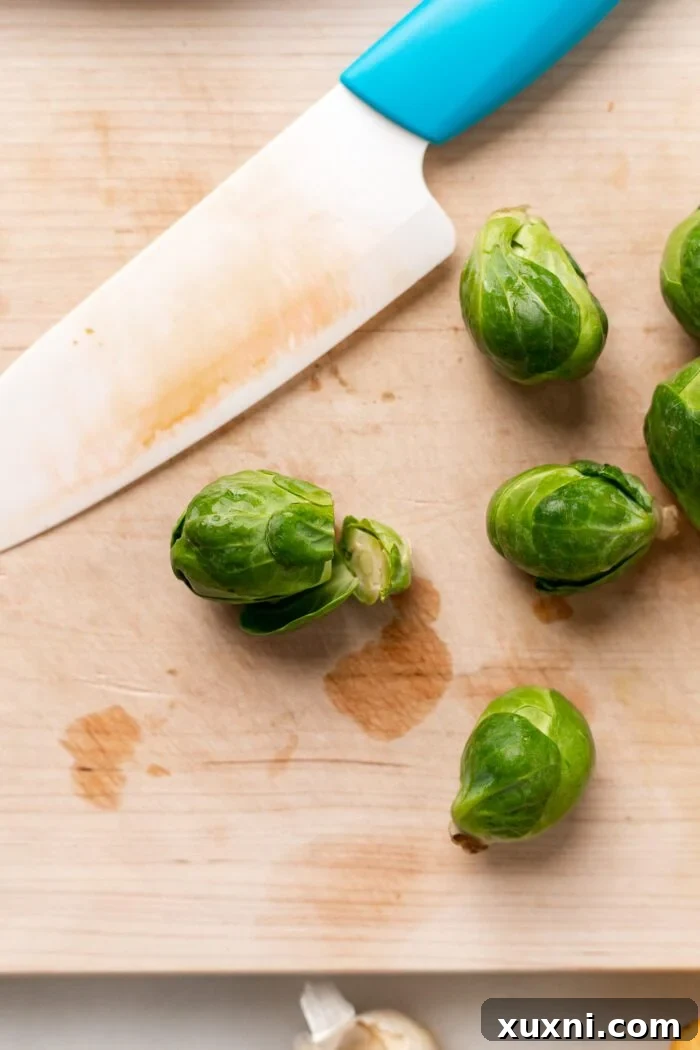 peeling off the Brussels sprouts shells