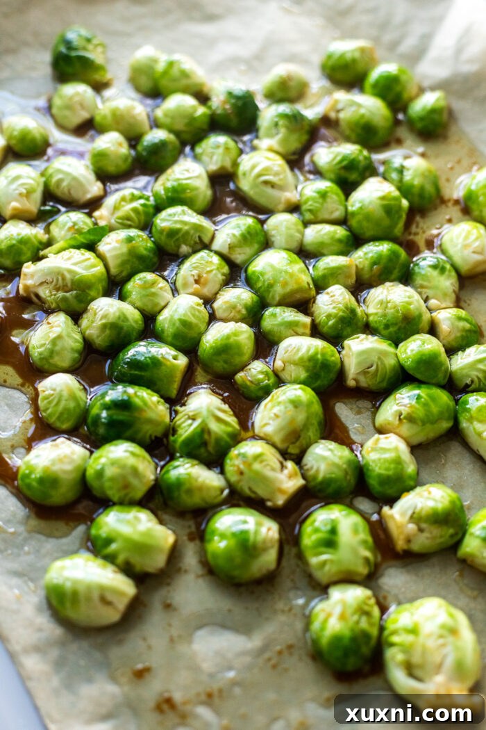 Brussels sprouts face down on baking sheet