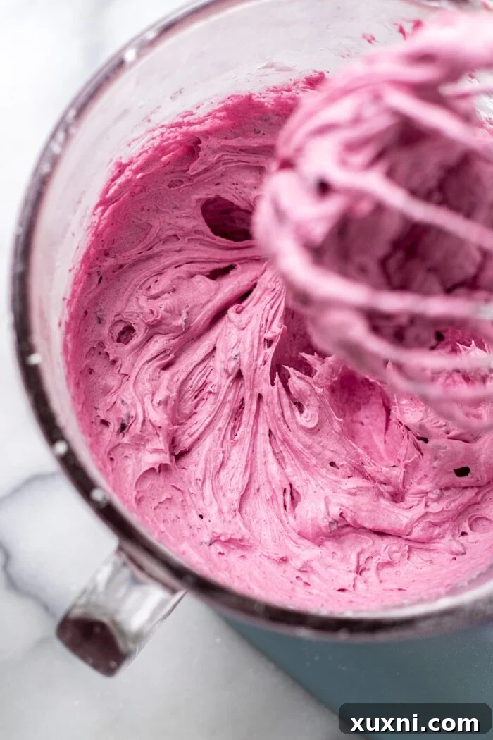 blueberry frosting in a stand mixer