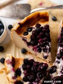 slice of vegan Basque cheesecake on parchment paper