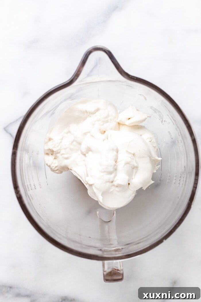cream cheese in a mixing bowl