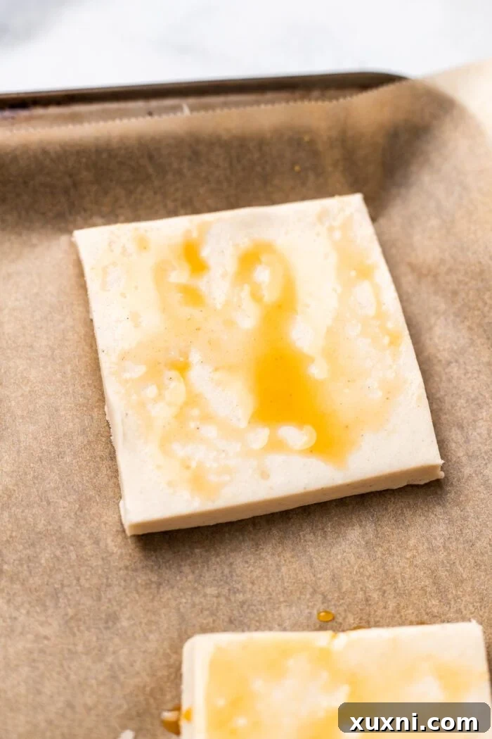 Gluten-free puff pastry brushed with a vegan egg wash for a golden finish.