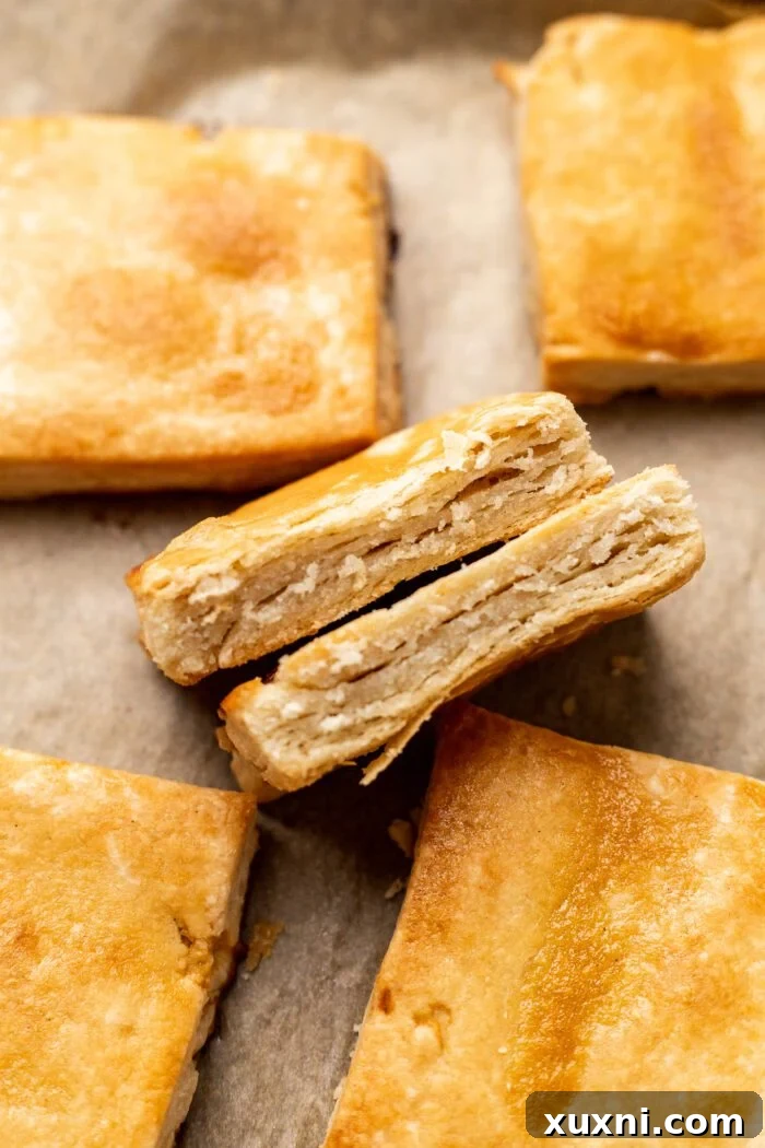 Freshly baked gluten-free puff pastry, golden and flaky, ready to serve.