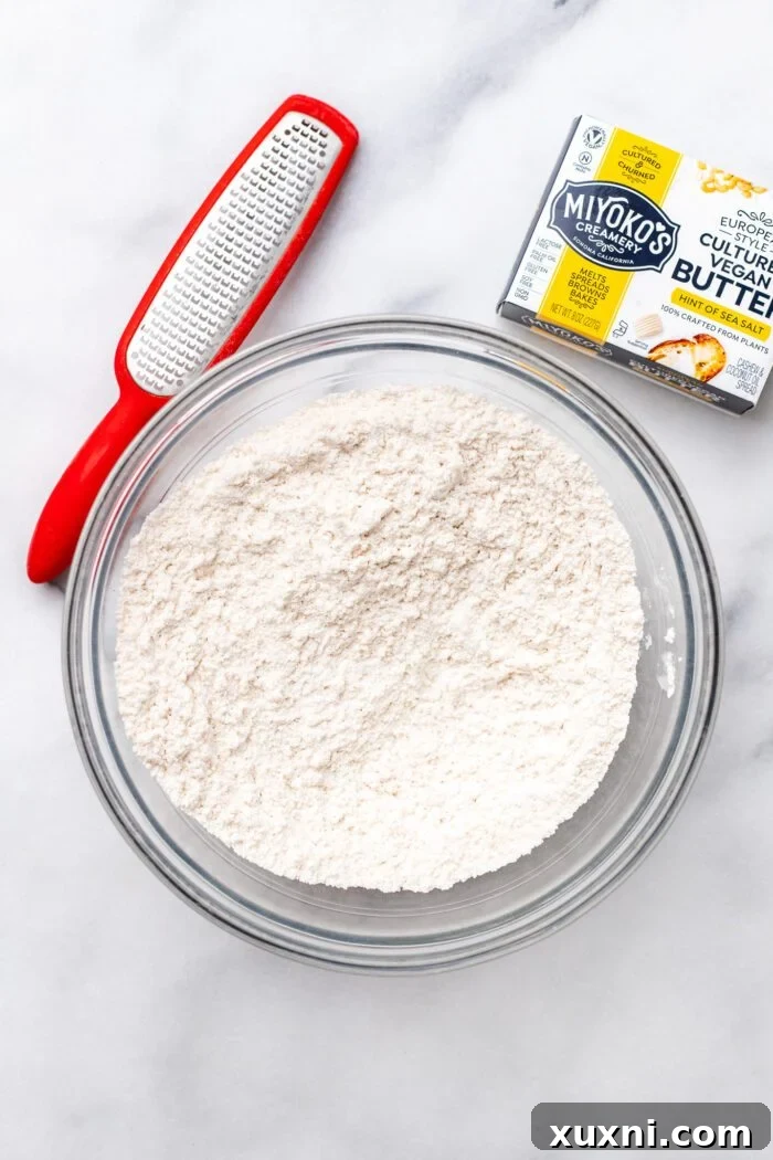 Dry gluten-free flour blend mixed in a bowl, ready for butter.