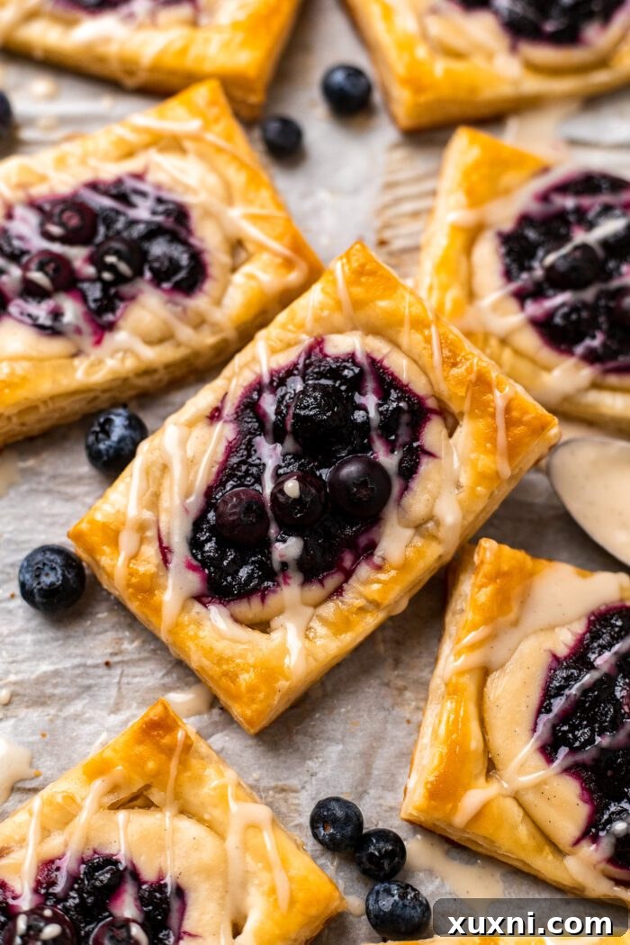 Irresistibly flaky and sweet vegan blueberry cream cheese Danish pastries, easily made gluten-free and ready in minutes.