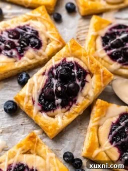 gluten free vegan blueberry danish on parchment paper