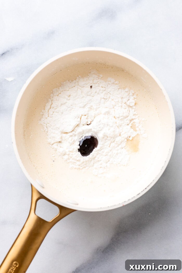 vegan custard ingredients in a sauce pan