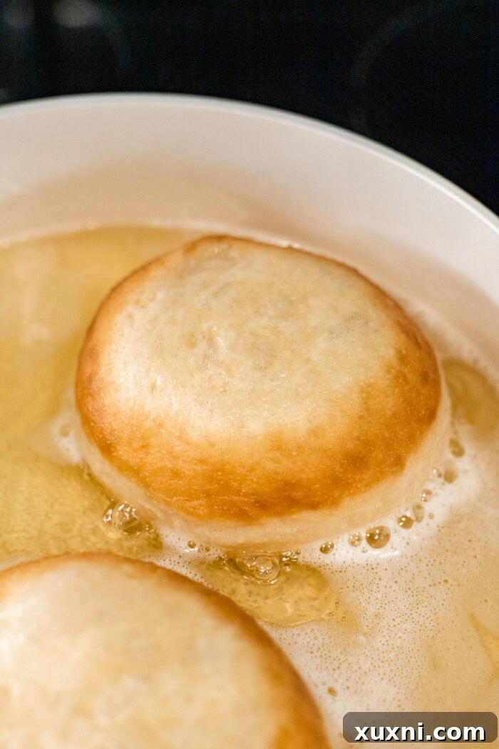 frying doughnut dough
