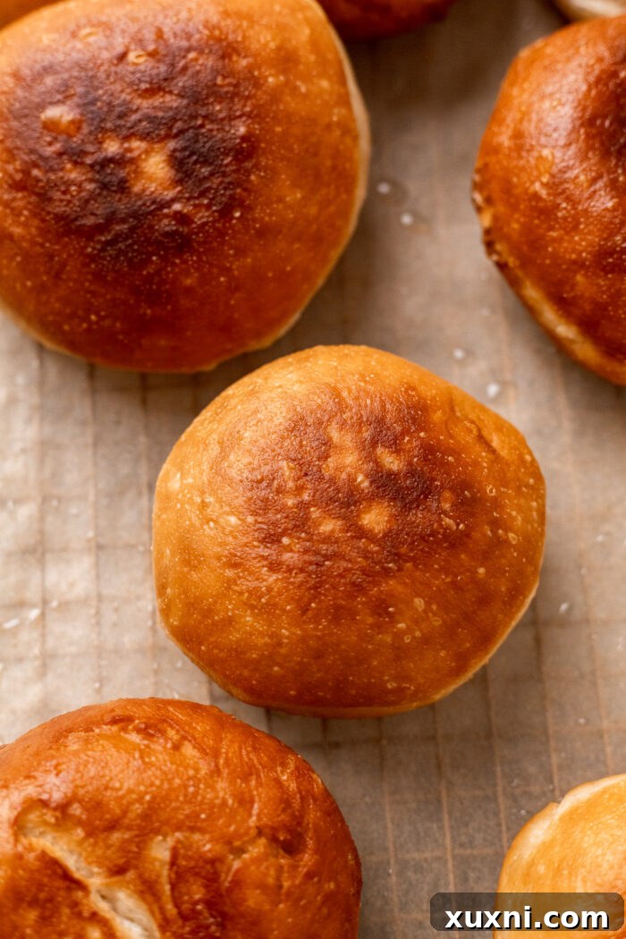 fried doughnuts on parchment paper