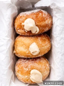 vegan cream filled doughnuts in a pan
