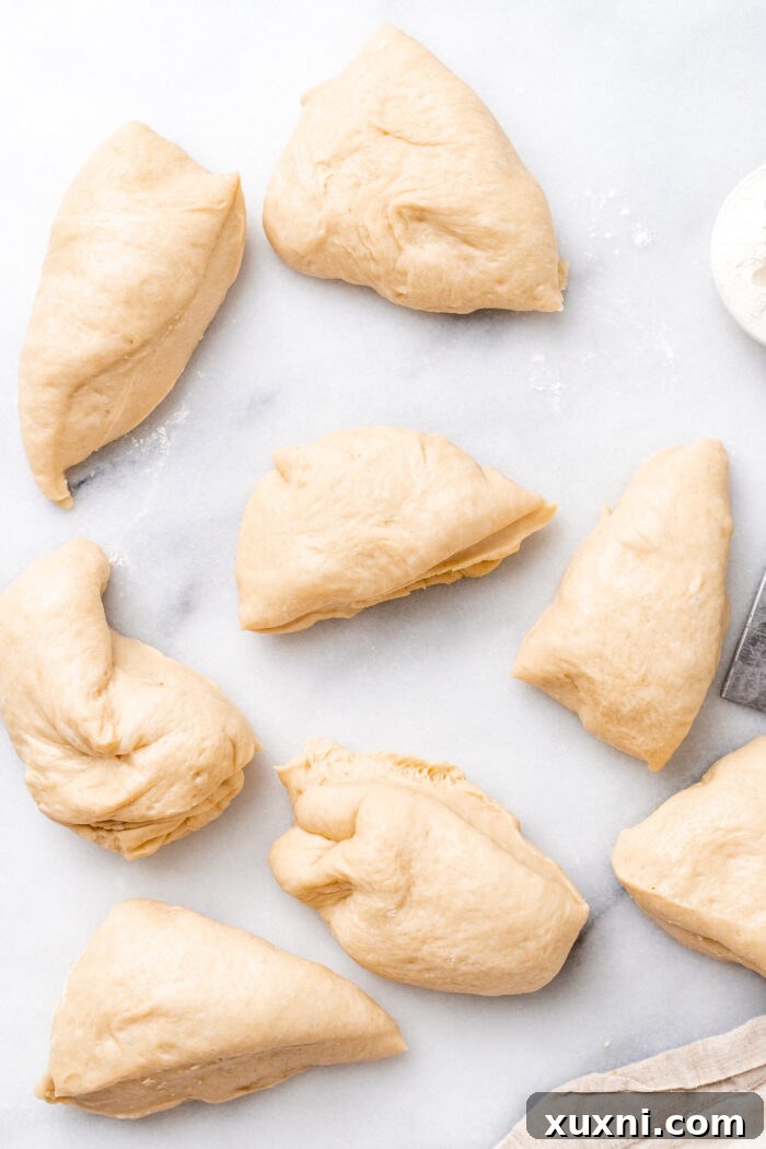 doughnut dough divided on marble