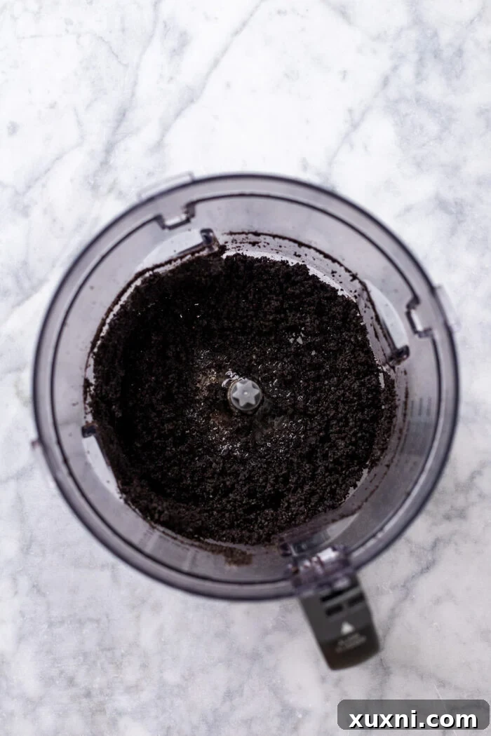 Easy No Bake Plant Based Chocolate Mini Cheesecakes 5 Oreo cookies and vegan butter pulsed together in a food processor, creating a fine crumble for the cheesecake crust.