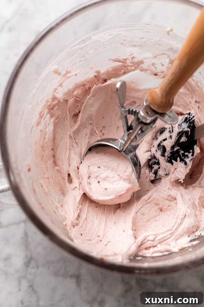 Vegan raspberry buttercream in a mixing bowl