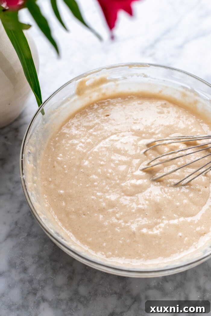 Vanilla pound cake batter in a mixing bowl