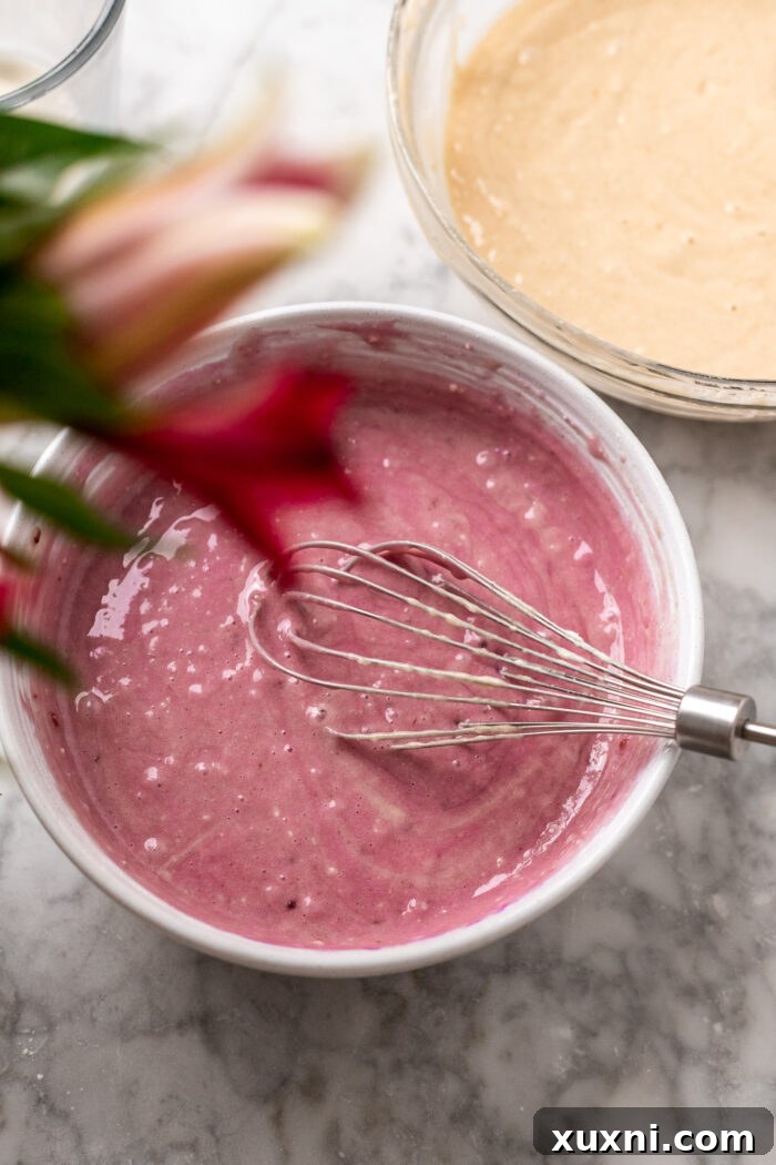 Raspberry pound cake batter in a mixing bowl