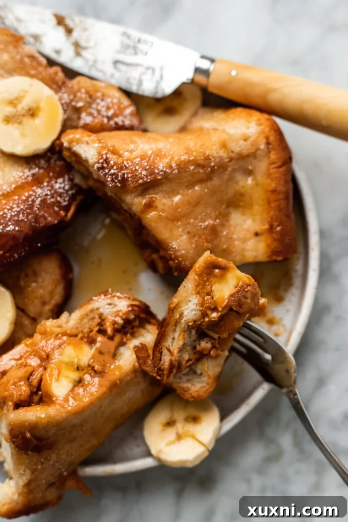 sliced vegan stuffed French toast on a plate