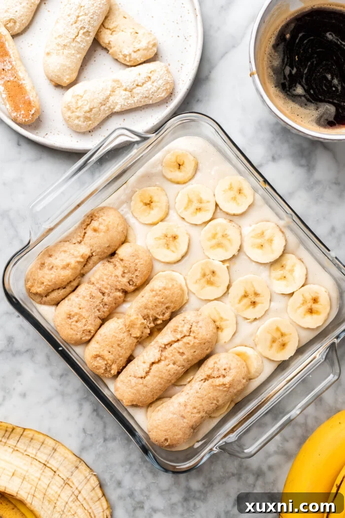 assembling the banana pudding tiramisu