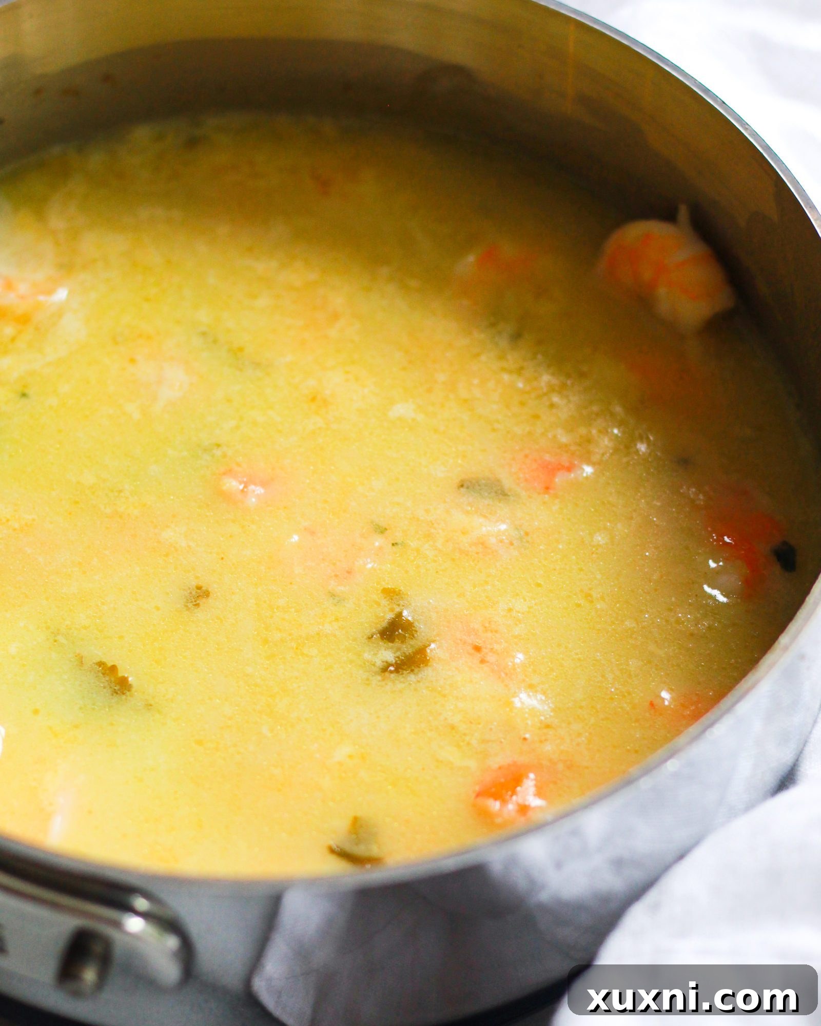 Creamy Thai Coconut Curry Shrimp 11 close up of skillet with thai coconut curry