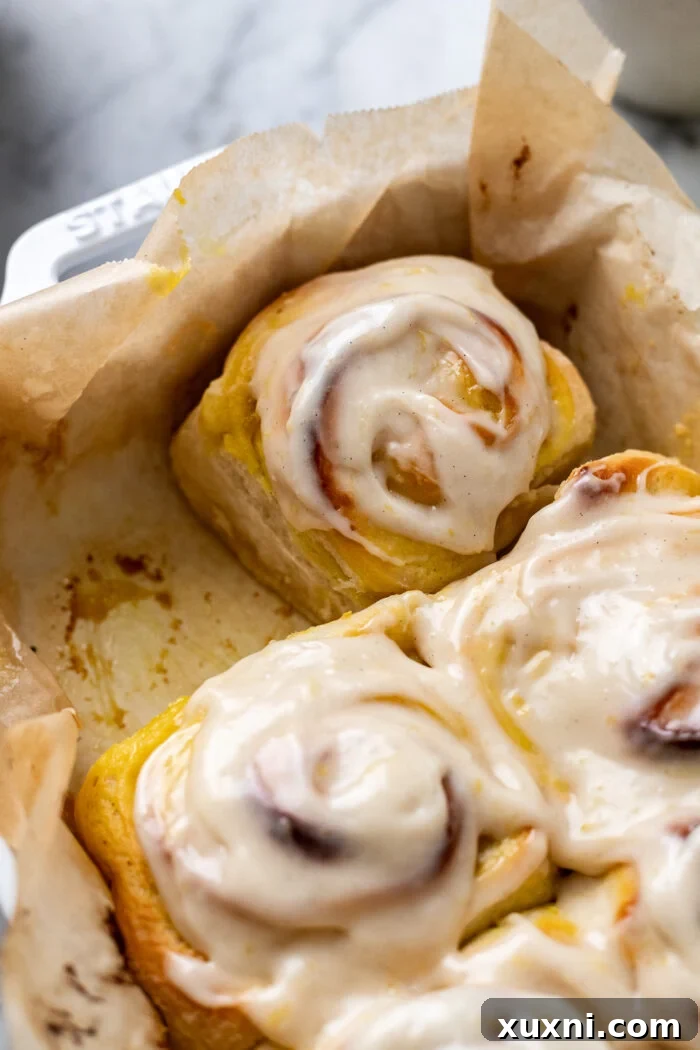 Small Batch Gooey Lemon Sweet Rolls Plant Based 5 Raw, shaped lemon sweet rolls placed in a casserole dish, ready for their final rise before baking.
