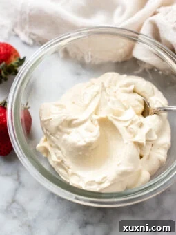 A bowl of creamy vegan mascarpone, highlighting its smooth texture.