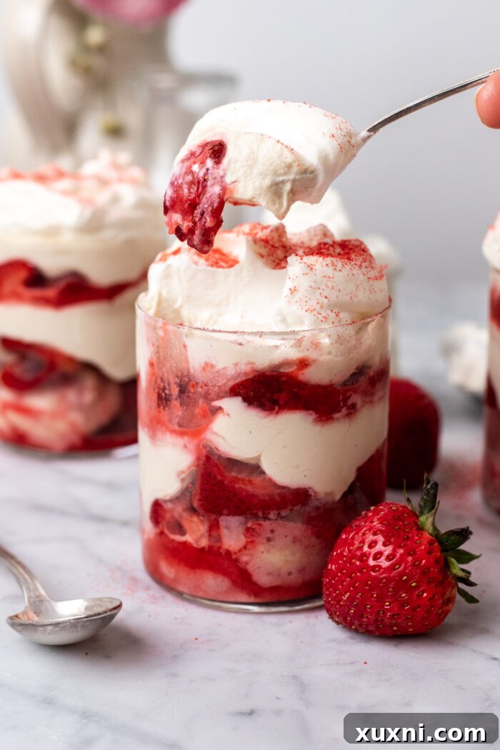 spoon eating vegan strawberry tiramisu