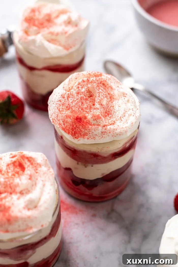 vegan strawberry tiramisu cups on a marble table