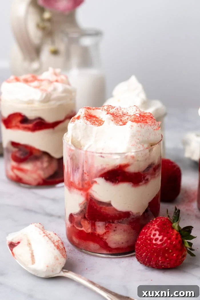 jars of vegan strawberry tiramisu on marble table