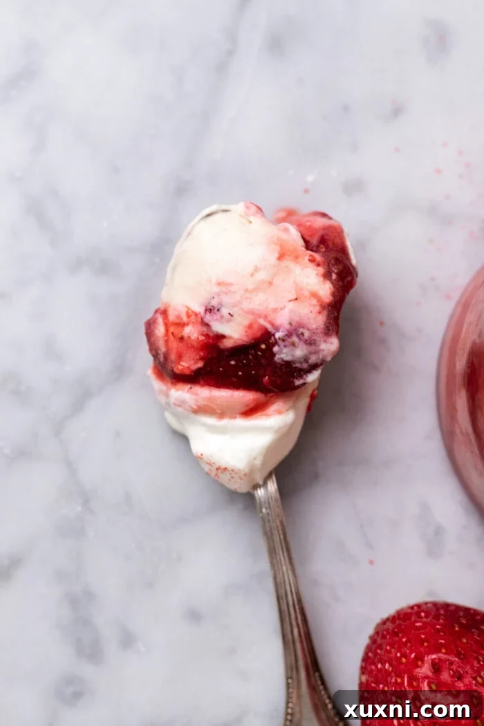 spoon of vegan strawberry tiramisu
