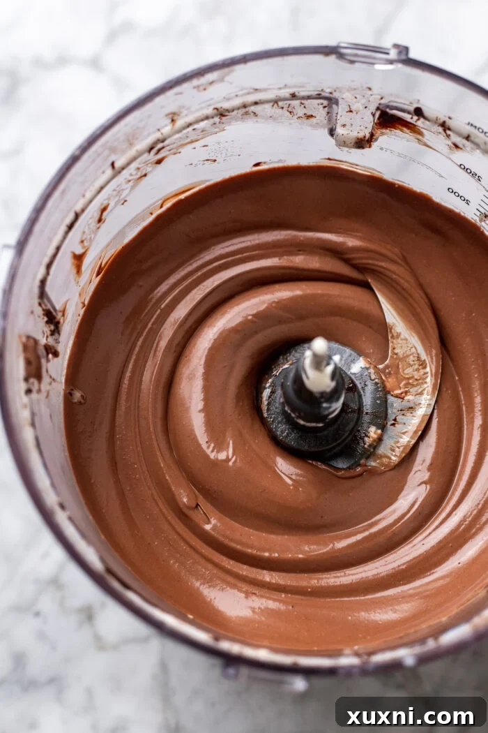 Easy No-Bake Vegan Brownie-Cookie Dough Cheesecake Bars 7 blended cookie dough batter