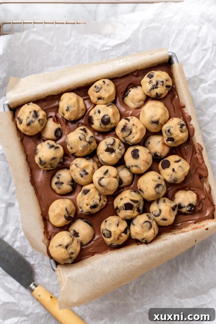 Easy No-Bake Vegan Brownie-Cookie Dough Cheesecake Bars 9 frozen cookie dough brownie cheesecake bars