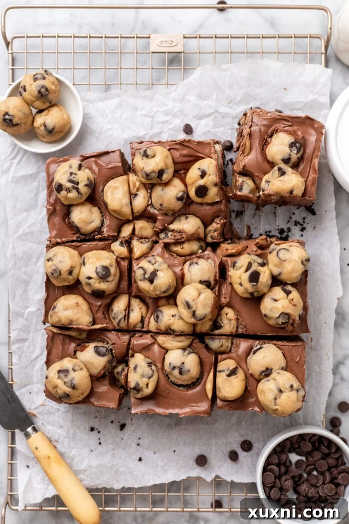 Easy No-Bake Vegan Brownie-Cookie Dough Cheesecake Bars 10 sliced cookie dough brownie cheesecake bars