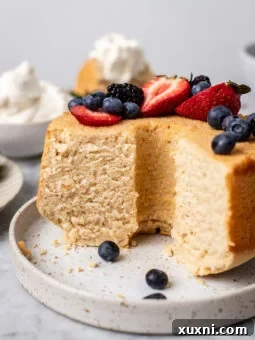 Vegan angel food cake on a plate sliced