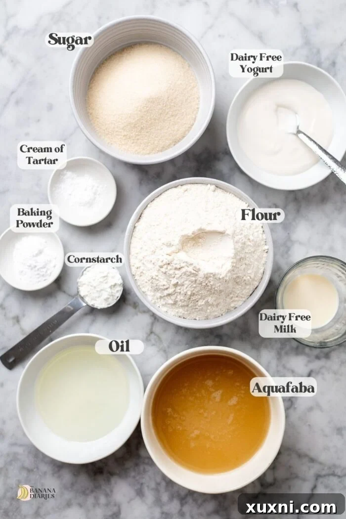 Heavenly Vegan Angel Food Cake 5 All the vegan angel food cake ingredients laid out on a surface, ready for baking.