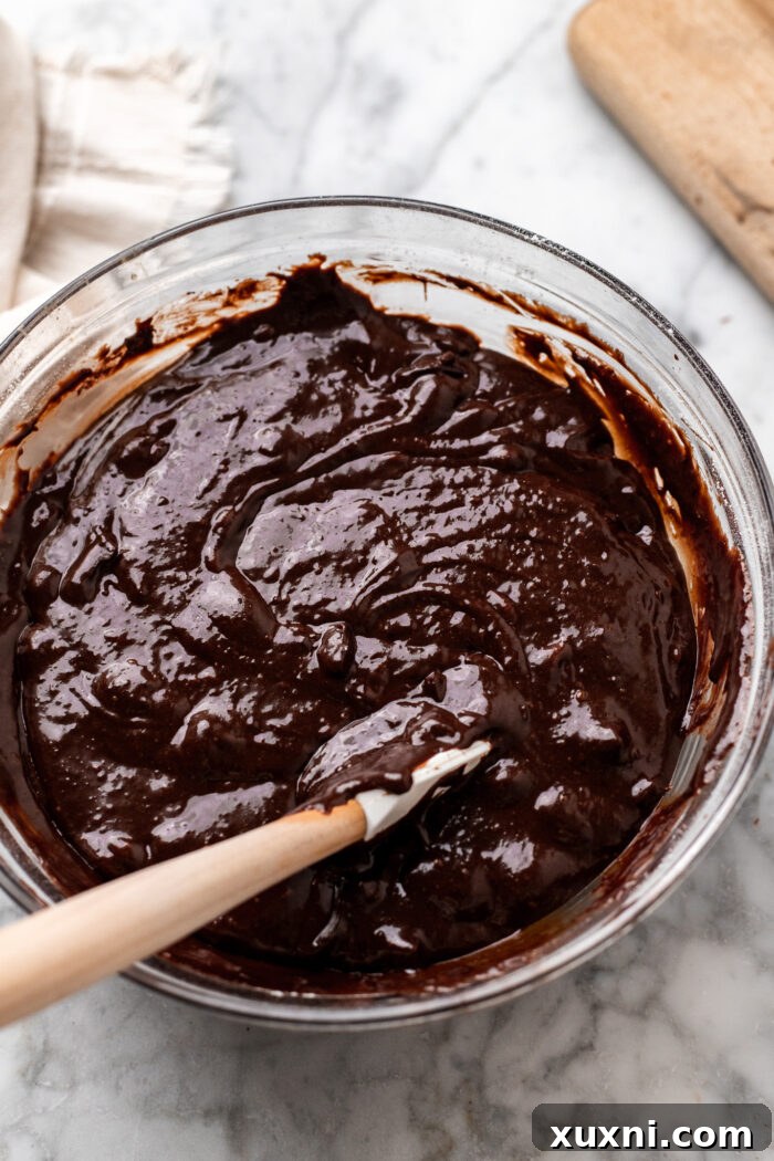 Finished vegan brownie batter, thick and glossy